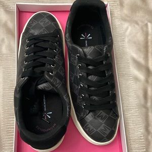 Black and Gray Issac Mizrahi sneakers. Very comfortable and stylish.